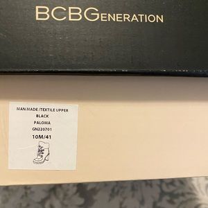 Excellent condition, never worn, black BCBG lace up boot